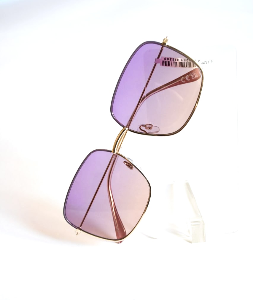 عینک آفتابی وارداتی accessories فریم طلایی | لنز شفاف بنفش
